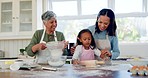 Family, parents and girl baking in kitchen for lunch, breakfast and prepare meal together. Cooking, morning and grandmother, mom and child at home with ingredients for bonding, quality time and love