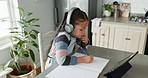 Online class, tablet and child with headphones thinking in kitchen, learning and exam for home school. Elearning, studying and writing test, girl with homework in house for virtual classroom project.