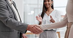 Business people, handshake and applause for b2b, deal or partnership together in teamwork at the office. Businessman and woman shaking hands for agreement, promotion and clapping in team success