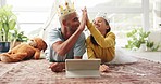 Tablet, dad and daughter fantasy with a high five for motivation or support on the bedroom floor. Family, children and a proud father playing with his female kid for education or child development