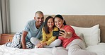 Bed, selfie and family with happiness, quality time and bonding with fun, morning and loving together. Photo, parents and kid in a bedroom, home and female child with mother, father and social media