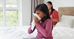 Paper, sick and child sneeze in bedroom home with allergy, virus or covid. Tissue, kid and girl blowing nose in bed for allergies, medical health problem and bacteria, cold and fever with mother