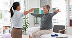 Physical therapy, senior patient and chiropractor, stretching and motion with exercise and progress in consultation. Help, support and women at clinic, elderly care and fitness with health and physio