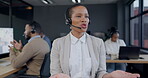 Call center, speaking and woman, consultant or agent for telemarketing communication or customer support. Workspace, telecom agency and African person talking on headphones on chat or virtual helping