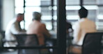 Business people, meeting and corporate discussion against a blurred background at the office. Group of employees in team planning, presentation or training staff for collaboration at the conference