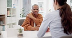 Woman, doctor and senior patient with shoulder pain in consultation for diagnosis or relief at the hospital. Elderly female person talking to medical healthcare expert for cure or wellness at clinic