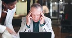 Stress, multitasking and senior businessman with headache from team pressure, chaos and fatigue in office. Crisis, fail or corporate manager with anxiety, mistake and migraine with documents or audit