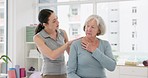 Woman, physiotherapist and consulting senior patient for rehabilitation of shoulder pain, arthritis or medical advice. Doctor, physiotherapy support and healthcare assessment for chiropractic injury