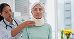 Doctor, senior woman and neck brace after injury, accident or hospital emergency. Medical professional, elderly person and collar in consultation for healthcare, wellness or healing in rehabilitation