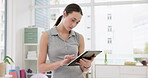 Tablet, wellness and physiotherapy with a woman in a clinic for healthcare, research or rehabilitation.  Technology, medical and a young female physiotherapist or medicine professional in her office