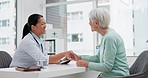Handshake, senior woman and healthcare support of doctor in a hospital for medical care. Elderly consultation, smile and insurance conversation with women in a clinic office for retirement advice