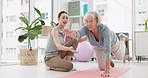 Physical therapy, healthcare and senior woman doing a exercise for wellness or recovery at a clinic. Medical, stretching and physiotherapist helping an elderly female patient at rehabilitation center