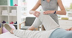 Physiotherapist, massage and medical training for patient with an injury for recovery as therapy rehabilitation. Joint, health and physiotherapy help person or client with knee motion and support