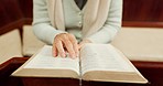 Studying, bible or hands of woman in church ready to worship God, holy spirit or religion in Christian cathedral. Faith closeup, learning or lady reading book in chapel praying to praise Jesus Christ