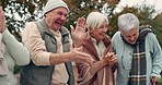 Friends, laughing and senior people in park for bonding, conversation and quality time together outdoors. Retirement, happy and elderly man and women in nature with funny joke, humor and happiness