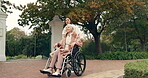 Senior woman, wheelchair and caregiver in park, nature or garden outdoor together. Happy, elderly person with a disability and walking for health, wellness and physical therapy for rehabilitation