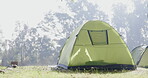 Nature, fog and tent for camping or vacation in the forest in the morning fog during winter. Park, trekking and shelter gear for travel, holiday or outdoor adventure in the mountains or countryside