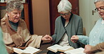 Praying, support and holding hands with people in bible study for worship, Christian and spiritual. Community, faith and religion with prayer group in church for connection, hope and meeting together