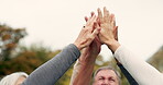 High five, partnership and a group of senior friends together in a park for motivation, success or celebration. Team building, support and community with elderly people bonding outdoor in a garden