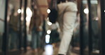 Professional, blurry and walking in lobby to meeting for planning with staff at company. Closeup, business and employees in corridor at corporate office for career or working together for job.
