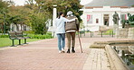 Nurse, relax and park with old woman and walking stick for retirement, elderly care and physical therapy. Trust, medical and healthcare with senior patient and caregiver in nature for rehabilitation