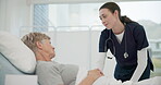 Doctor, conversation and senior woman in hospital bed for healthcare with support for retirement. Female medical, expert and care with elderly female for medical treatment at clinic for advice.