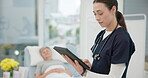 Nurse, checkup and tablet for results at hospital with patient for healthcare or consultation. Medical, expert and service with tech for diagnosis with medical treatment at clinic for help or advice.