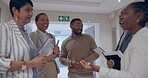 Happy business people, laughing and funny joke in meeting for team building or communication in the hallway. Group of employees talking together for fun social or teamwork in happiness at workplace