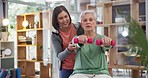 Healthcare, dumbbells and a senior woman in a physiotherapy clinic for rehabilitation, recovery or mobility. Fitness, medical or wellness and an elderly person training with her physiotherapist