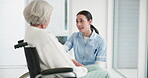 Medical, wheelchair and a woman nurse talking to a senior patient with a disability in a clinic. Healthcare, retirement and support with a female medicine professional talking to a resident at home