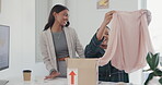 Office, friends and surprise present in box with clothes, package and online shopping delivery in cardboard from courier, shipping. Unpacking order, clothing and ecommerce customer or black woman