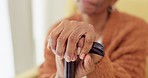 Hands, walking stick and senior woman with a disability, dementia or Alzheimer in a nursing home for senior care. Crutch, balance and old lady with osteoarthritis, Parkinson or osteoporosis or stroke