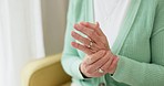 Hands, pain and arthritis with a senior woman in her nursing home, struggling with a medical injury or problem. Healthcare, ache or carpal tunnel with an elderly resident in an assisted living house