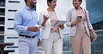 Walking, talking and business people on balcony with tablet, discussion and brainstorming startup ideas. Conversation, online report or feedback with team, man and women on coffee break together.