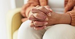 Hands, stress and senior woman on a sofa with anxiety, fear or grief, dementia or scared in her home. Stress, worry and nervous elderly female in a living room with Alzheimer, arthritis or depression