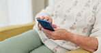 Senior woman, hand typing and phone for communication, contact with internet connection or online for social media post. Elderly person, hands and writing an email, message or search on smartphone