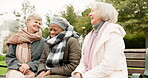 Senior, funny and relax with friends on park bench for retirement, happy and health. Elderly, happiness and social with old women laughing in nature for wellness, conversation and peace together