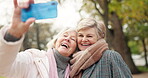 Senior happy woman, friends and selfie in nature for photography, memory or bonding together in park. Elderly women smile in happiness enjoying photo moment, vlog or social media in outdoor forest