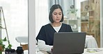 Laptop, healthcare and woman nurse in her office doing research for a diagnosis or treatment. Technology, telehealth and young female medical worker on a computer for a medicare report in hospital.