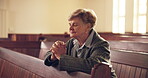 Senior, woman and praying in church for faith for help with peace in jesus christ for retirement. Meditation, christian and elderly woman  for forgiveness with god during sunday service for healing.