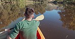 Camping, lake and back of man in kayak for sports, fitness and fun, journey or adventure in nature. Kayaking, rowing and behind guy in river with paddle for summer, workout or sport, hobby or freedom