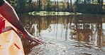 Camping, lake and hand of man in kayak for sports, fitness and fun, journey or adventure in nature. Kayaking, boat and fingers of guy in river for summer, workout or sports, hobby or weekend freedom