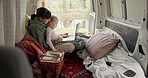 Mom, girl and camping vacation with laptop, van or transport for typing, search or games by lake. Computer, mother and daughter with click, keyboard or bonding in camper with video, movie or learning