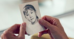 Hands, photograph and memory with a senior adult thinking about the past while in a nursing home. History, vintage and retirement with an elderly person holding a picture closeup to remember life
