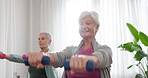 Senior people, dumbbell and fitness class for teamwork, support and retirement health and wellness. Exercise, workout and elderly women or friends stretching with motivation and happy muscle training