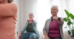 Senior woman, dumbbell and class for exercise, training or workout together in weightlifting at old age home. Happy elderly women in fitness, weight loss or practice for physiotherapy or healthy body