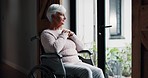 Senior woman, wheelchair and thinking by window in retirement for hope, dream or faith at old age home. Lonely elderly female or person with a disability in wonder, decision or looking out in grief