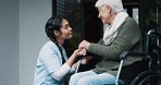 Nurse, senior woman and holding hands in wheelchair for support, healthcare and happy. Comfort, caregiver and person with a disability together for empathy, kindness and talk in a retirement home