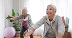 Fitness, yoga and senior woman friends in a home studio to workout for health, wellness or balance. Exercise, zen and chakra with elderly people training for mindfulness together while breathing