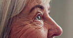 Senior woman, eyes and focus for eye exam, test or assessment of vision, eyesight and optometry for elderly patient. Eye, problem and closeup on old lady with wrinkles, natural skin and wellness